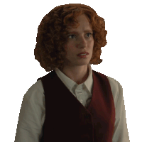 a woman with red curly hair wearing a white shirt and a red vest