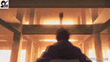 a gif from a anime lover shows a man standing on a balcony