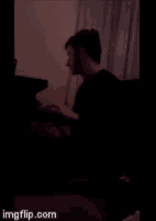 a blurred image of a person laying on a bed with the website imgflip.com visible in the corner