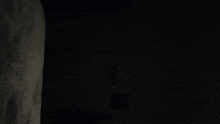 a purple and black background with a light coming out of the corner