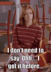 a woman is sitting in a chair with the words i don 't need to say ohh