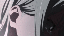 a close up of a person 's ear with a butterfly earring on