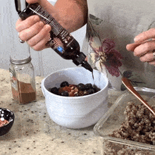 pouring date syrup the whole food plant based cooking show making it sweeter adding sweetness preparing food