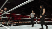a wrestling match is being shown on a w live channel