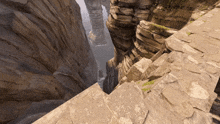 a view of a canyon with a few steps going down it