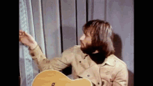 Looking Out The Window Barry Gibb GIF - Looking Out The Window Barry Gibb Bee Gees GIFs