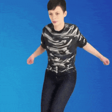 a person wearing a camouflage shirt and black pants is dancing on a blue background
