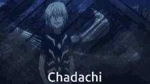 a person standing in front of a building with the word chadachi written on it