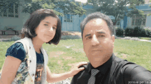 a man and a little girl are posing for a picture with the date dated 6/19/20