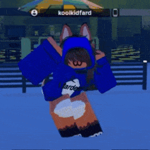 a girl in a blue hoodie is jumping in the air