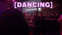 a group of people are dancing in a club and the words dancing are above them