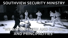 a black and white photo of karate fighters with the words southview security ministry on the top
