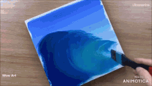 a person is painting a wave on a canvas with the words wow art made in animatica