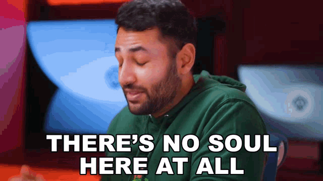 a man in a green hoodie is saying there 's no soul here at all