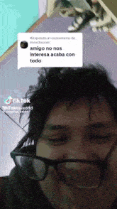 a man wearing glasses has a tiktok account
