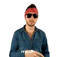 a man wearing sunglasses and a bandana with the word mcdh on the bottom right