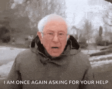 a man in a jacket is standing in the snow and talking to someone .