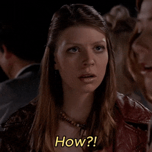 a woman in a red jacket says how