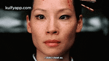 a close up of a woman 's face with the words `` i did n't think so '' written above her .
