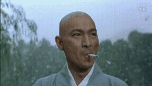 光头，刘德华，抽烟，和尚 GIF - Andy Lau Smoking Monk GIFs