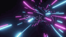 a bunch of neon lights are flying through a dark space