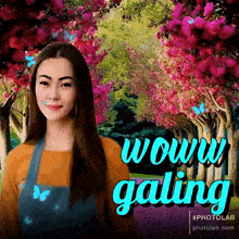 a woman is standing in front of trees with pink flowers and says wow galing