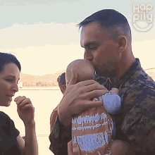 Kissing The Baby Happily GIF - Kissing The Baby Happily Love GIFs