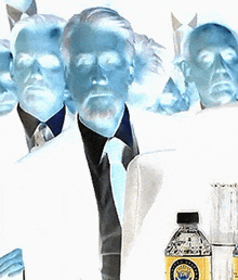 a bottle of aquafina sits next to a glass