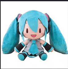a stuffed doll with blue hair and headphones