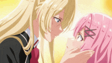 a blonde girl and a pink girl are touching noses