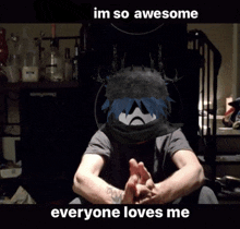 a picture of a man with a sad face and the words everyone loves me