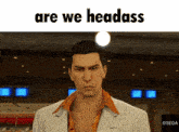 a man in a striped suit stands in front of a sign that says " are we headass "