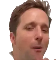 a close up of a man 's face making a funny face