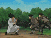 a man in a white kimono is standing in a field with three other men