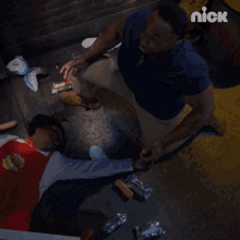 a man is laying on the ground with the word nooo written on it