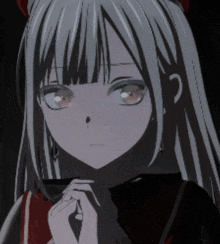 a close up of a girl 's face with white hair