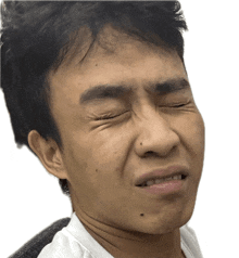 a close up of a man 's face with his eyes closed and his mouth open