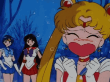 a group of anime girls are standing next to each other and one of them has a heart on her face