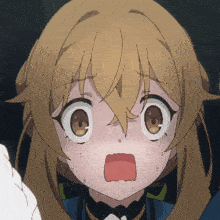 a close up of a girl 's face with a surprised look on her face
