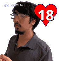 a man with glasses and a heart with the number 18