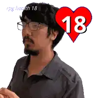 a man with glasses and a heart with the number 18