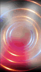 a picture of a red and blue circle with a blurred background