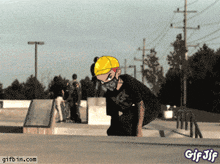 a gif of a person doing a trick at a skate park with gifbin.com at the bottom