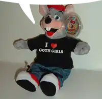 chuck e cheese stuffed animal wearing a shirt that says i heart goth girls