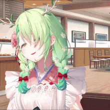 a girl with green hair and antlers stands in a cafe