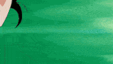 a close up of a man 's face with a green background