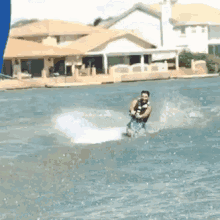 a man is riding a water ski in the water
