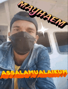 a man wearing a mask and a hat says mayhaem assalamualaikum