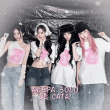 a group of girls are posing for a photo with the words aespa solo de cata on the bottom