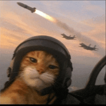 a cat wearing a helmet looks at a missile flying through the air